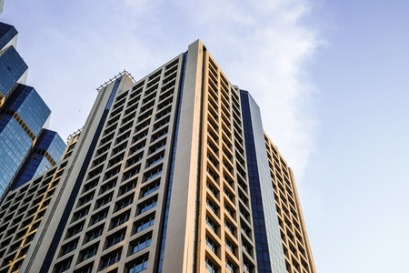 Bottom view of modern skyscrapers in business district against blue sky, Bangkok Thailandのeditorial素材