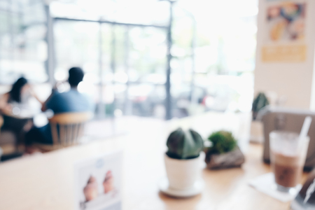 Blurred coffee shop with people vintage tonnedの写真素材