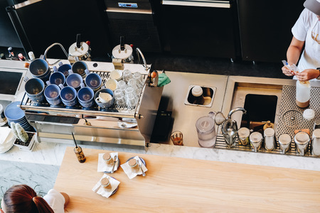 Coffee shop counter bar modern machine food and drink businessのeditorial素材