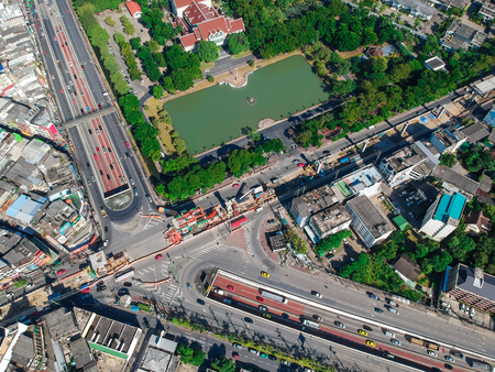 Top aerial view photo from drone of a developed Bangkok city with modern skyscrapers, Thailand