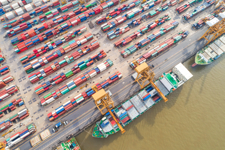 Container ship in import export tradeport top view from drone, Business logisticのeditorial素材