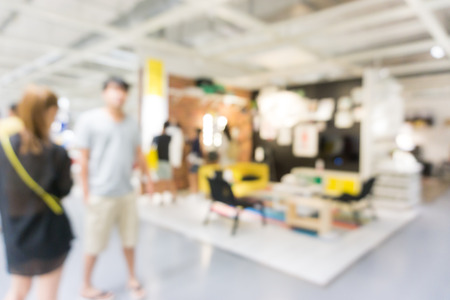 Blur people inside modern funiture store shopping mallの写真素材