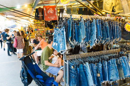 Bangkok, Thailand - Feb 5, 2017 - foreign tourist buys some Thai handicraft souvenirs at chatuchak market in bangkok Thailandのeditorial素材