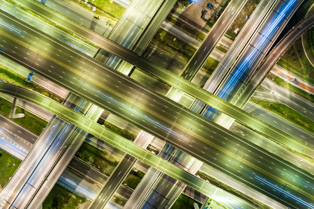 Aerial view night city traffic freway intersection road long exposer image
