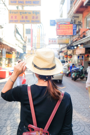 Asian tourist women travel in Yaowarat Chinese road for shopping, Bangkok Thailandの写真素材
