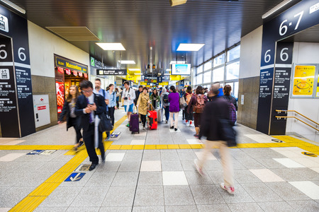 Passenger motion blurred rushing in the train station backgroundのeditorial素材