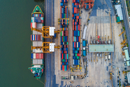 Cargo with container ship in dock at port, Aerial view of transport pier