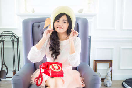 Fashion women with old phone in room smiling women