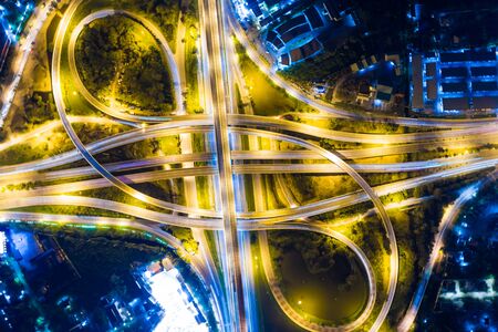 Intersection cross road with vehicle movement aerial view by drone, City transportの写真素材