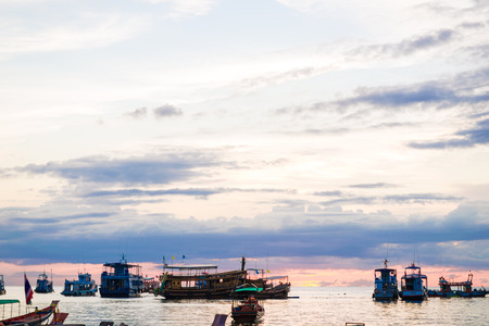 Beautiful cloud colorful sky sunset silhouette boat on beach, Seascapeのeditorial素材