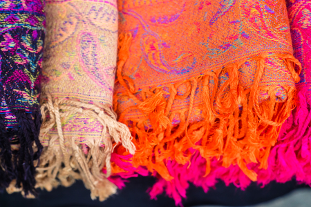 Tradition scarf handmade colorful cotton texture in souvenir shop close up
