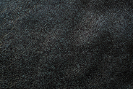 Black genuine fullgrain cow leather texture skin backgroundの写真素材