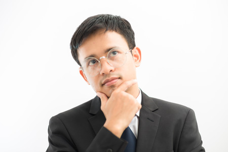 Professional business man with eye glasses on white backgroundの写真素材