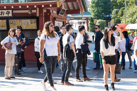 Toyko, Japan - 20 OCT 2016: Tourists walk on Nakamise Dori in Sensoji shrine on october 20, 2016. Sensoji temple at Japan.のeditorial素材