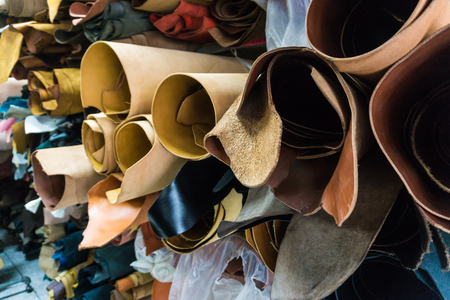 Raw cow vegetable tanned leather sheet crafts in shop, Craftsmanship object