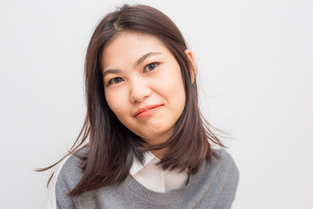 Beautiful Smiling Women With Clean white skin Felling Happy On White Backgroundの写真素材