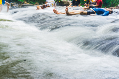 Trad, Thailand - April 29, 2018: Tourist enjoying in Klong Chao water fall tropical forestのeditorial素材