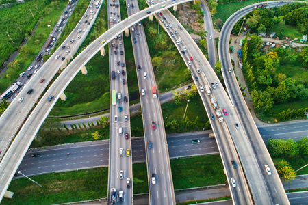 Intersection city cross road with car movement aerial view