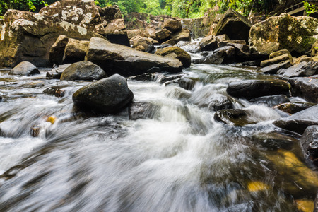 Klong Yai Kee Waterfall in tropical rain deep forest in Koh Kood island, Thailandの写真素材