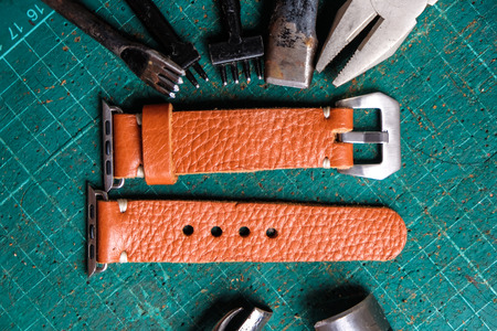 Genuine leather watch band strap handmade of crafts working with metal tool
