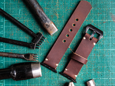 Genuine leather watch band strap handmade of crafts working with metal tool