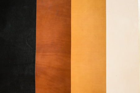 Genuine vegetable tanned leather of 4 color shade texture background, Leather industrial