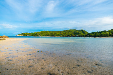 Rocky sea beach Andaman coast line with turquoise water summer vacationの写真素材