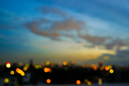 Abstract blurred light of modern city with colorful sky cityscapeの写真素材