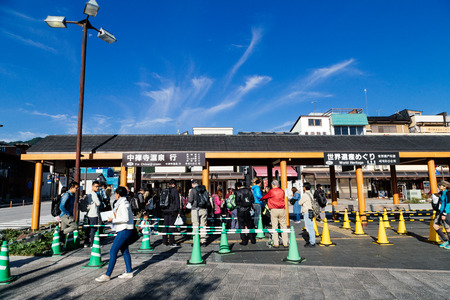 NIKKO, JAPAN - OCTOBER 21, 2016 : People waiting tour bus at Tobu Nikko Station,This is a popular travel of nature world heritage from tokyo, Japanのeditorial素材
