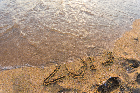 2019 Happy new year on seashore sand beach sunset colorful skyの写真素材