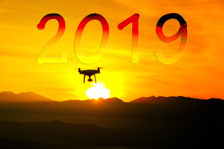 Drone flying on mountain sunset sky with cloud, Aerial photographyの写真素材