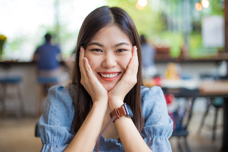 Beautiful asian women sitting in coffee shop, Business womenの写真素材
