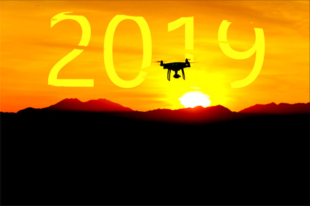 Drone flying on mountain sunset sky with cloud, Aerial photographyの写真素材