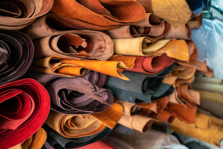 Tanned leather on shelf in craftsmanship marketの写真素材