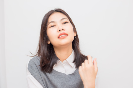 Beautiful smiling asian cute women post on white background, Wellness womenの写真素材