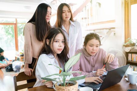 Office interior casual young business women talking discussion online business plan, Group of womenの写真素材