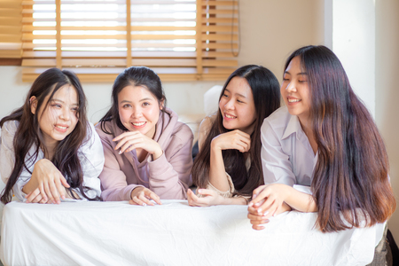 Group of pretty young asian women friend on bed fashion meeting conceptの写真素材