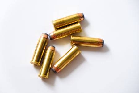 Gun FMJ JHP and JSP bullet on white background with copy space