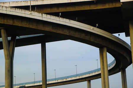 Modern Bhumibol bridge curve road with blue sky in Bangkok Thailand