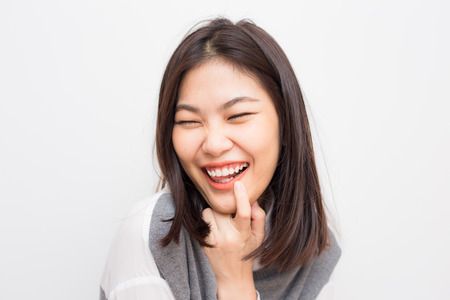 Smiling asian beautiful women on white background, Fashion womenの写真素材