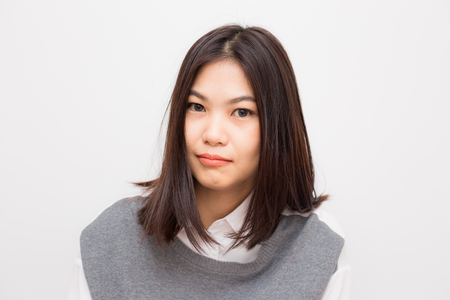 Smiling beautiful asian white collar women on white backgroundの写真素材
