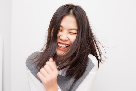 Smiling asian beautiful women on white background, Fashion womenの写真素材