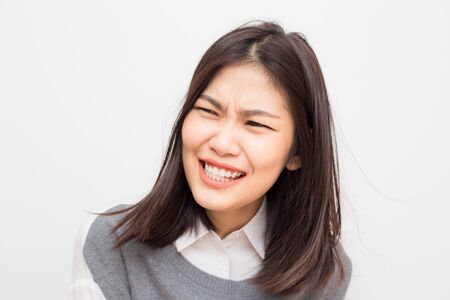 Bautiful asian women smiling and fell delicious on white backgroundの写真素材