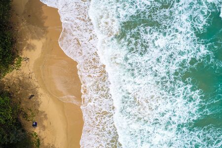 Sea wave on beach turquoise water aerial view