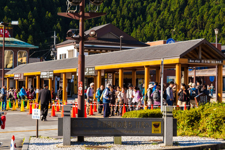 NIKKO, JAPAN - OCTOBER 21, 2016 : People waiting tour bus at Tobu Nikko Station,This is a popular travel of nature world heritage from tokyo, Japanのeditorial素材