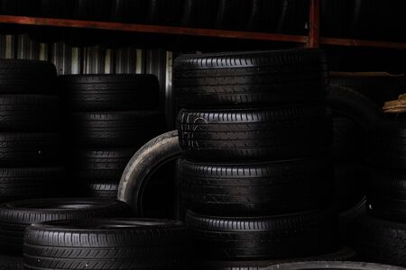Many type of car tire in garage shop transport industryの写真素材