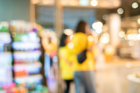 Blurred bokeh people shopping in supermarket moderntrade business backgroundの写真素材