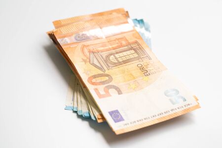 Euro bill money note pile bundle on white background business finance concept