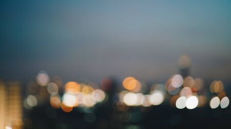 Abstract blurred bokeh night city building bokeh backgrond, Downtown Bangkok cityの写真素材