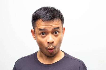Portrait of amazing facial expression asian men face on white background, Wow men face